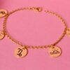 60B5D063-C600-4444-88A4-1F01B2E0FA09 Pulseira Adulta, Personalizada com Pingentes Redondos, Banhado a Ouro