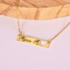 7-B91-F4-E2-638-D-4969-A5-D1-E99-FB32-F2-F03.jpg Colar Placa, Personalizado com Nome e Coração Vazado, Banhado a Ouro
