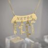 Whats-App-Image-2022-09-22-at-15-55-20.jpg Colar Canga Netos, com Nomes Pendurados, Banhado a Ouro
