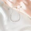 Whats-App-Image-2022-11-25-at-10-36-27-2.jpg Pulseira Riviera Baguete, Zircônia Cristal no Ródio Branco