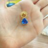 Pingente de Menino Vazado, com Zircônia Azul, Banhado a Ouro