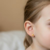 estrela- orelha Brinco Infantil Estrela, com Tarraxa Baby, Banhado a Ouro
